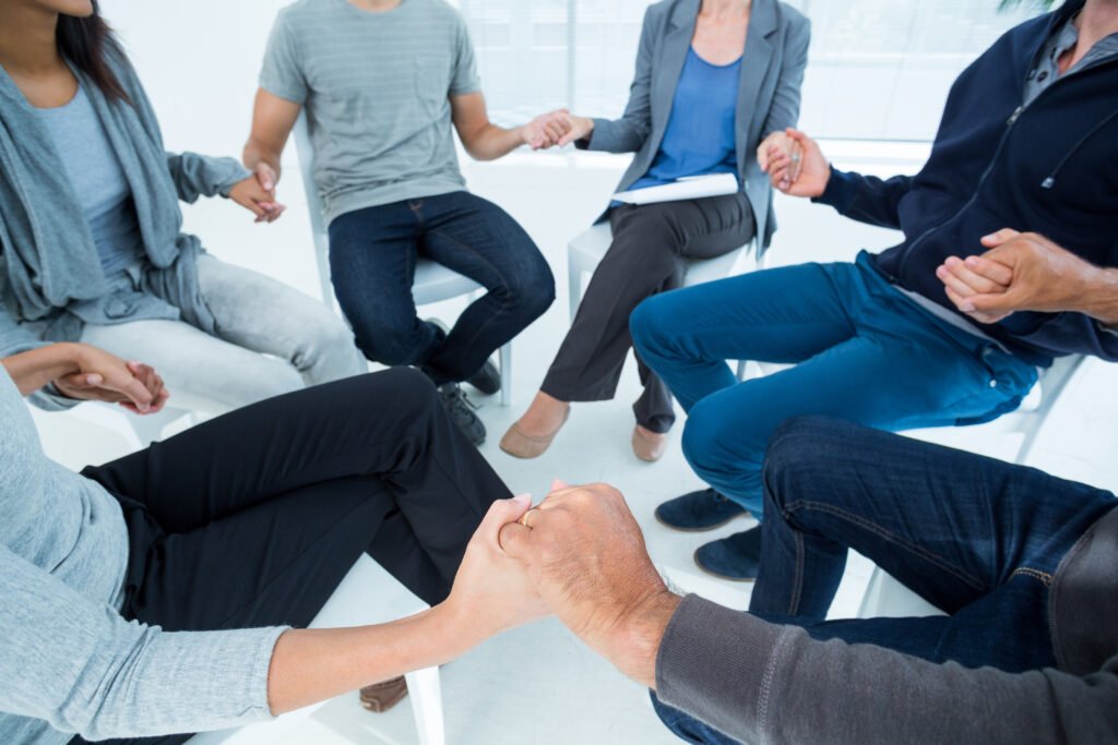 A group therapy in session at Thrive Treatment. Showing the setting where people in recovery build community.