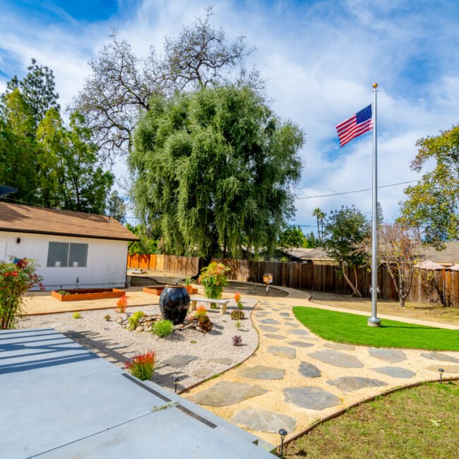 A giant flagpole in at Thrive Treatment residential and detox in Woodland Hills, California.